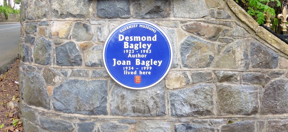 The Blue Plaque at Desmond and Joan Bagley’s former residence Câtel House, now renamed Bagley Hall, in the Rohais de Haut, St. Andrew, Guernsey. © The Bagley Brief.